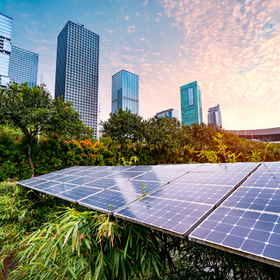 Solar panels with city skyline